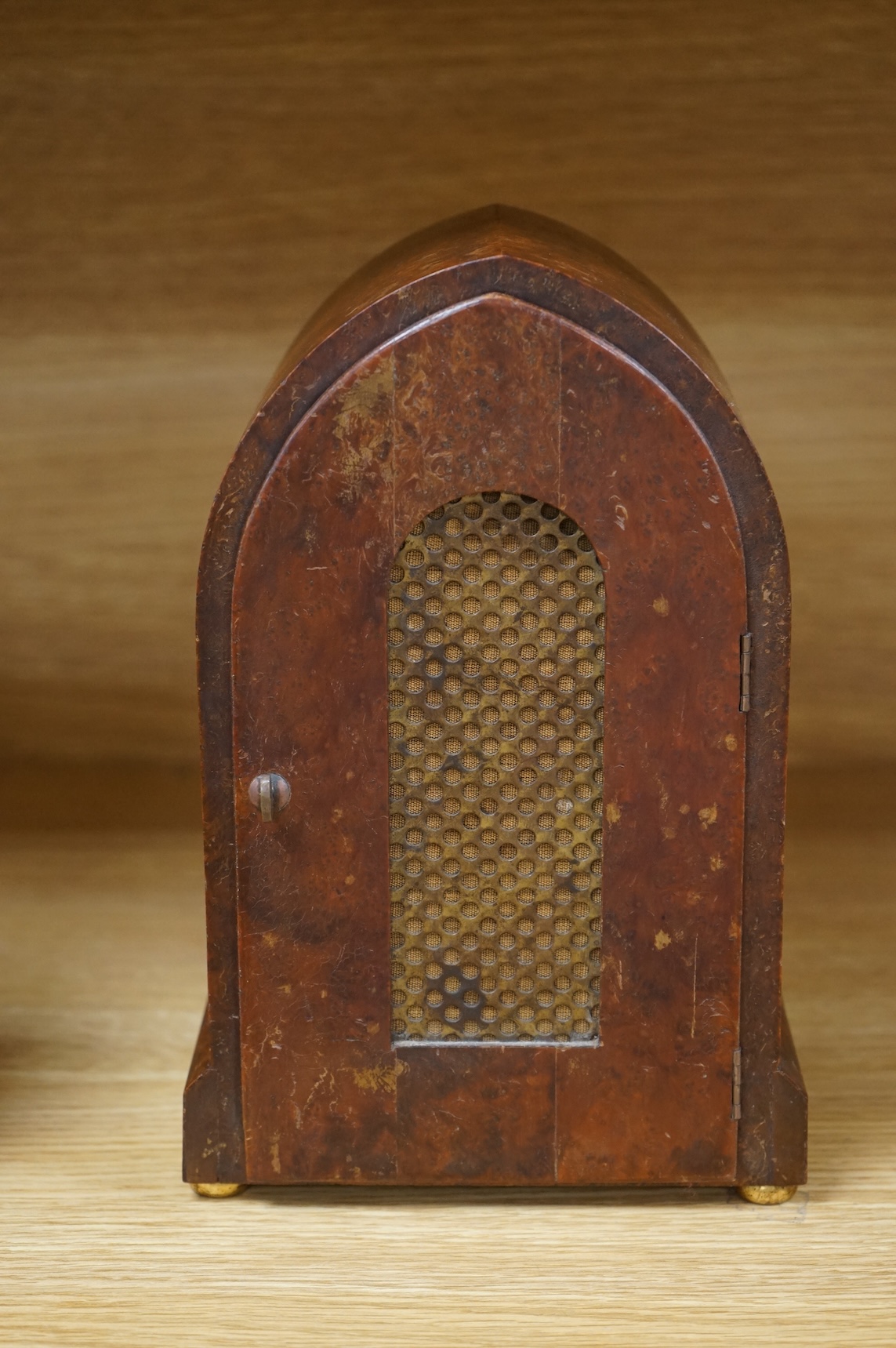 An early 20th century French eight day Amboyna mantel clock, with Holly and ivory stringing, retailed by Charles Frodsham, 25cm high CITES Submission reference 3SPE5K23